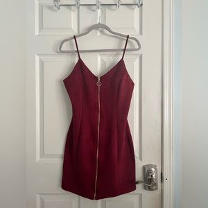 Woman’s red/burgundy dress with silver zip up size M